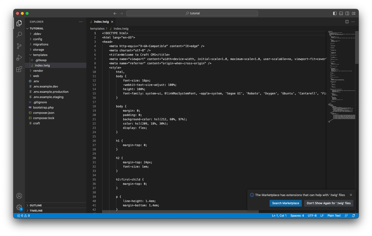 VS Code with index.html open and a prompt to install extensions visible